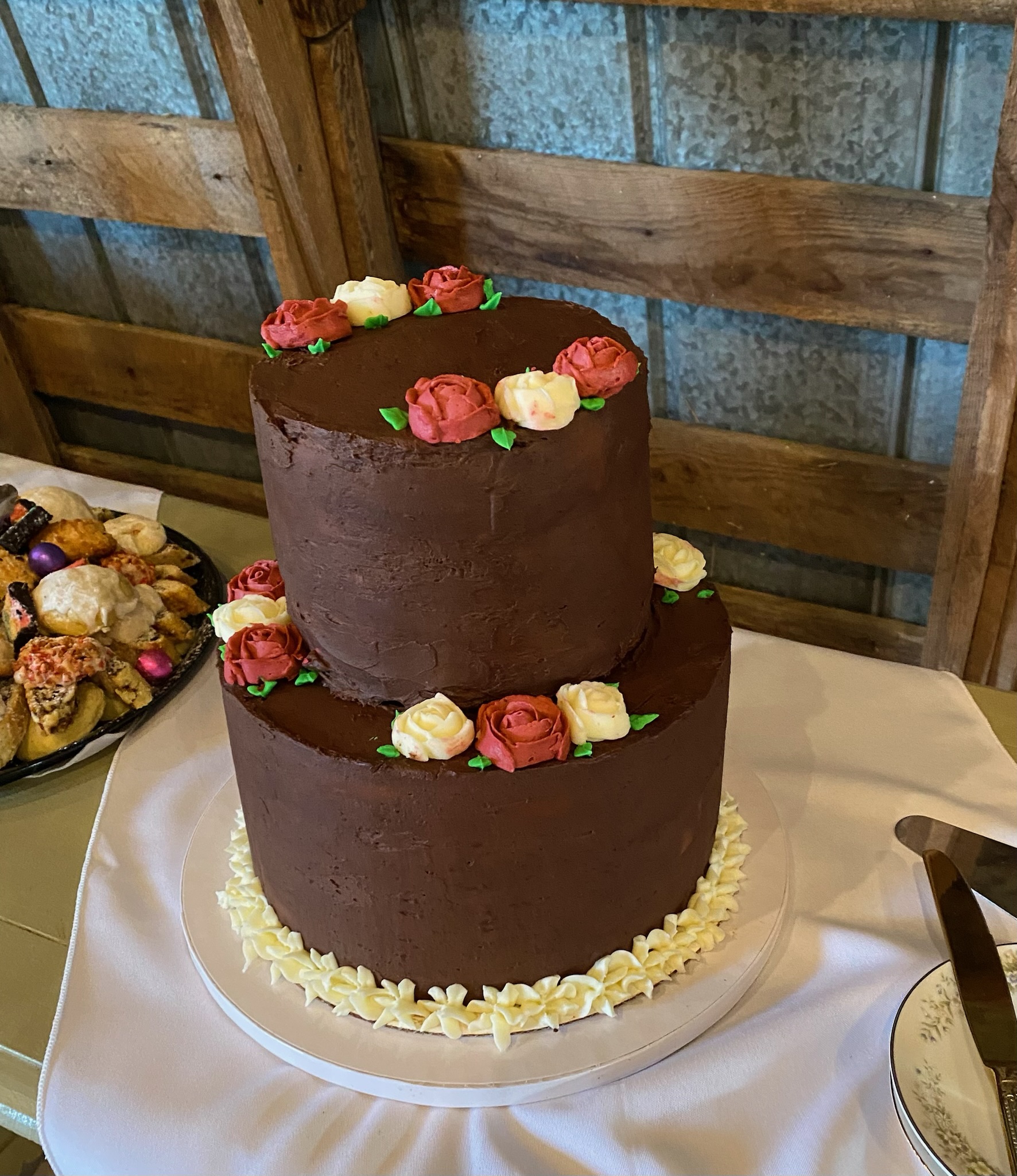 A decorated chocolate wedding cake.